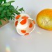 Small crochet yarn bowl with oranges