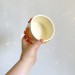 Small crochet yarn bowl with chanterelle mushrooms