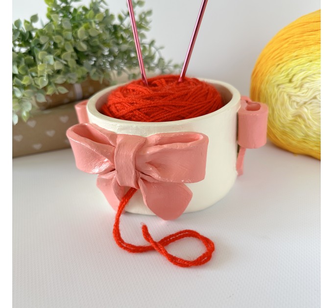Small milky white crochet yarn holder bowl with pink coquette bows Knitters crocheters