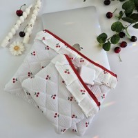 Laptop sleeve with cherries and ruffles