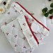 Laptop sleeve with cherries and ruffles