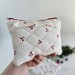 Laptop sleeve with cherries and ruffles