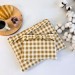 Latte vibe checkered brown laptop sleeve with ruffles