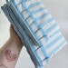Sky-blue striped laptop sleeve with ruffles