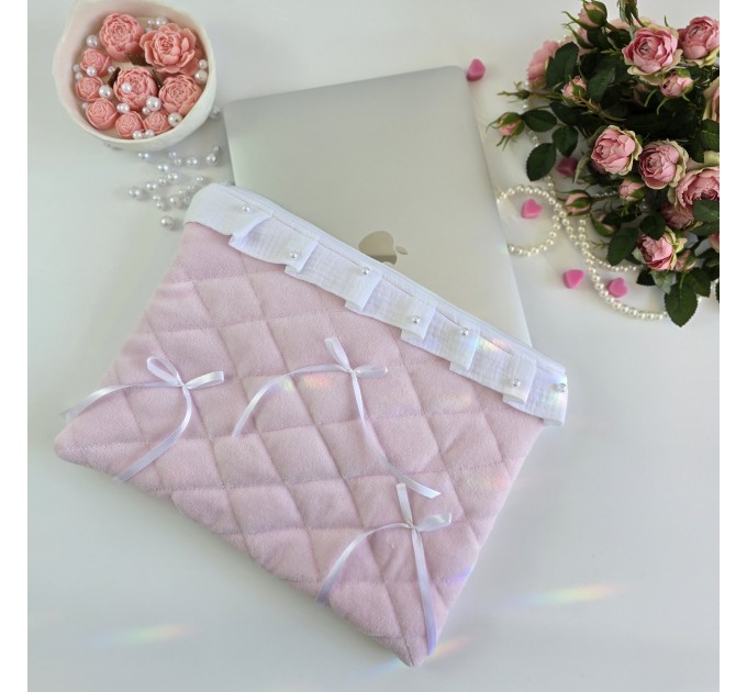 Soft pink laptop sleeve with ruffles, bows and pearl-like beads