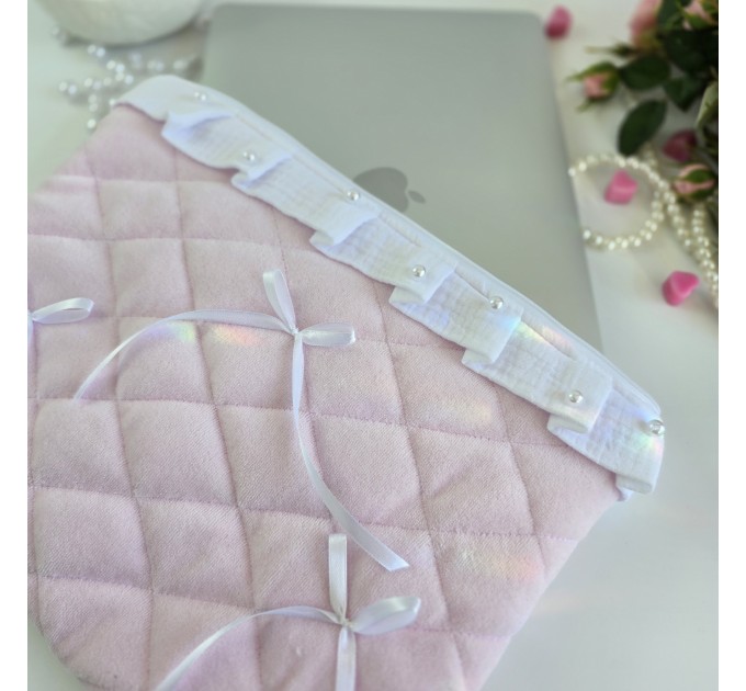 Soft pink laptop sleeve with ruffles, bows and pearl-like beads