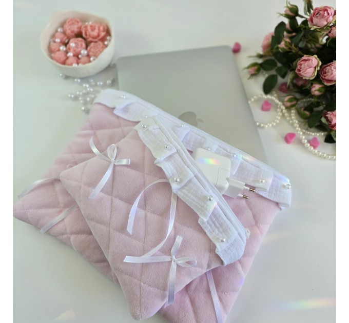 Soft pink laptop sleeve with ruffles, bows and pearl-like beads