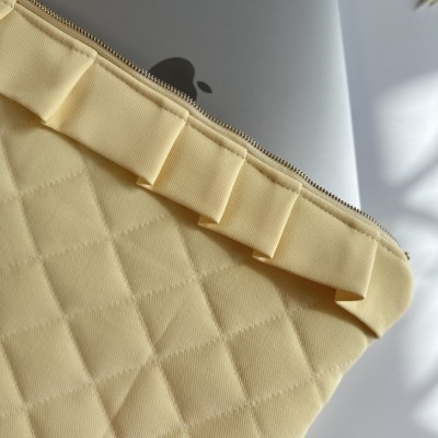 Butter yellow ruffle laptop sleeve