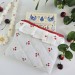 E-reader sleeve with cherries and ruffles