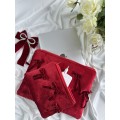 Red velvet laptop sleeve with bows
