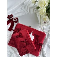 Red velvet laptop sleeve with bows