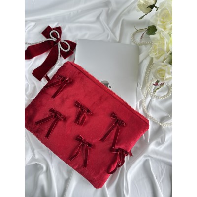 Red velvet laptop sleeve with bows