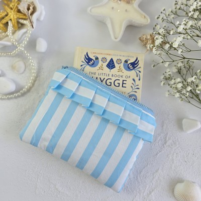 Sky-blue striped E-reader sleeve with ruffles