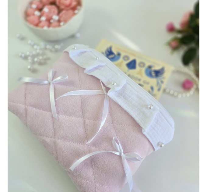 Soft pink E-reader sleeve with ruffles, bows and pearl-like beads