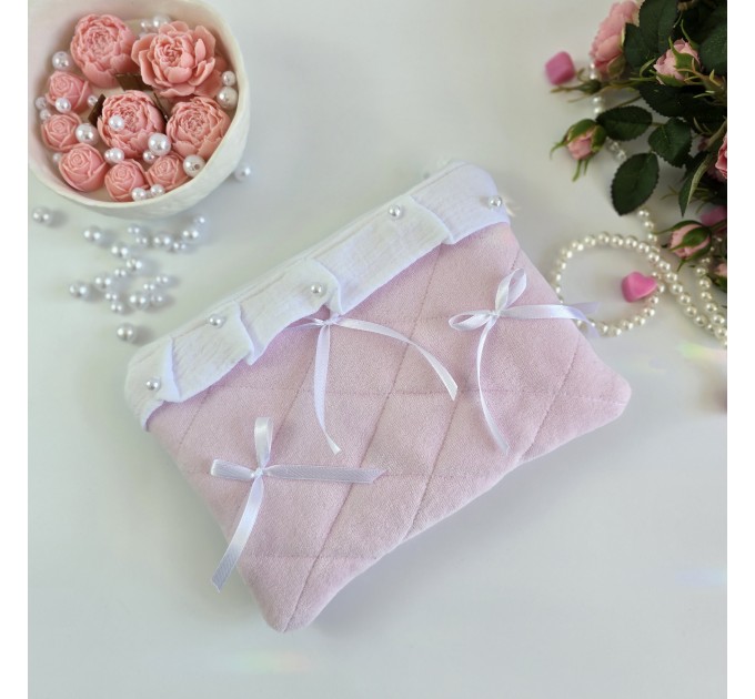 Soft pink E-reader sleeve with ruffles, bows and pearl-like beads