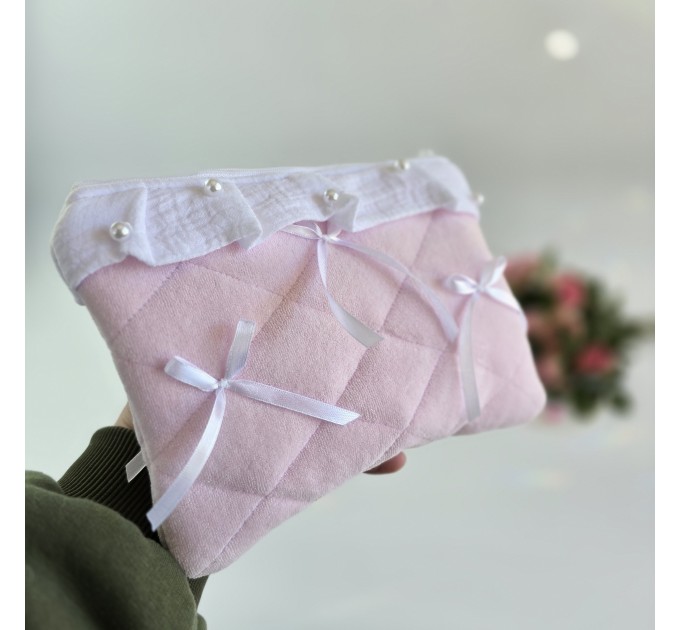 Soft pink E-reader sleeve with ruffles, bows and pearl-like beads