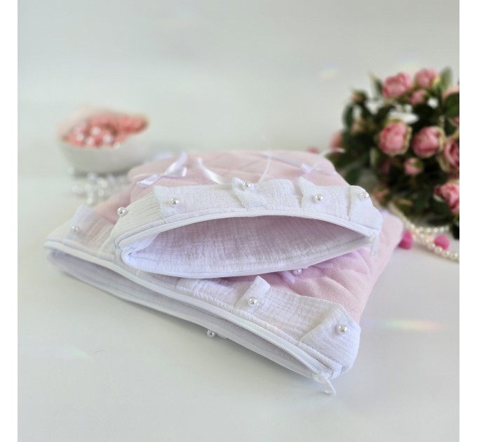 Soft pink tablet sleeve with ruffles, bows and pearl-like beads