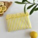 Yellow striped E-reader sleeve with ruffles