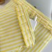 Yellow striped laptop sleeve with ruffles