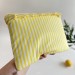 Yellow striped laptop sleeve with ruffles