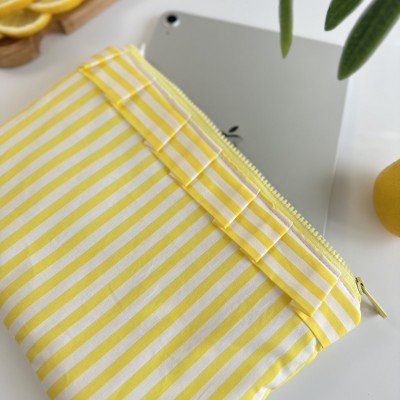 Yellow striped tablet sleeve with ruffles