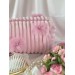 Large pink plush cosmetic bag with bows