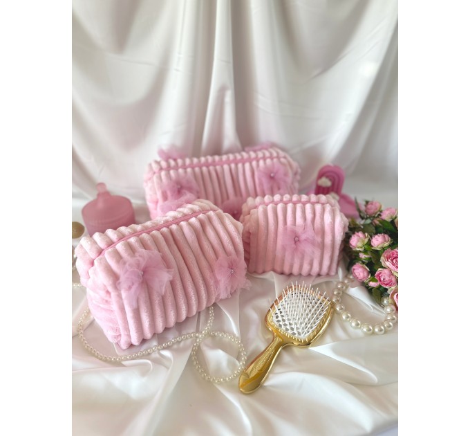 Large pink plush cosmetic bag with bows