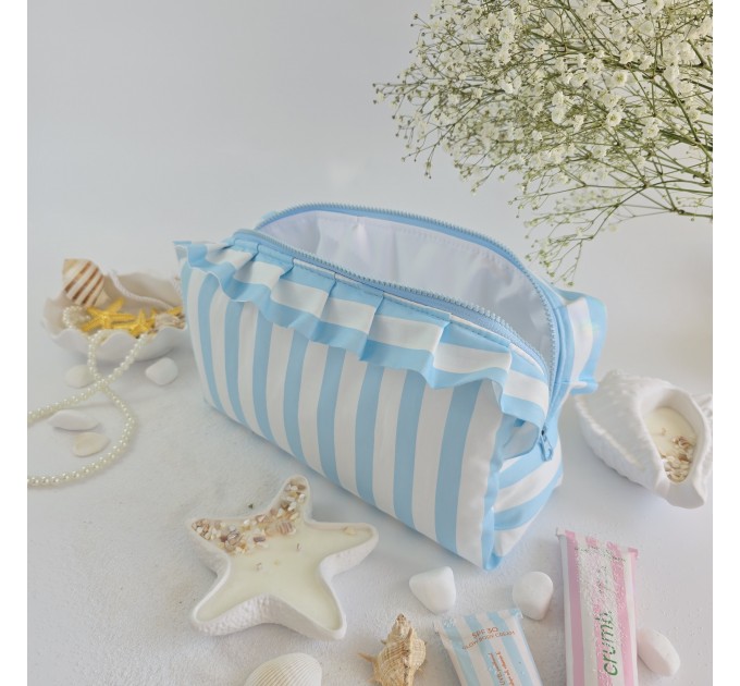 Large sky-blue striped cosmetic bag with ruffles