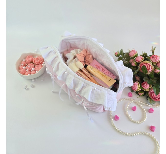 Large soft pink cosmetic bag with ruffles, bows and pearl-like beads