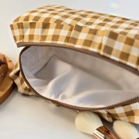 Medium checkered brown cosmetic bag with ruffles