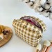 Medium checkered brown cosmetic bag with ruffles