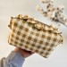 Medium checkered brown cosmetic bag with ruffles