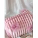 Medium pink plush cosmetic bag with bows