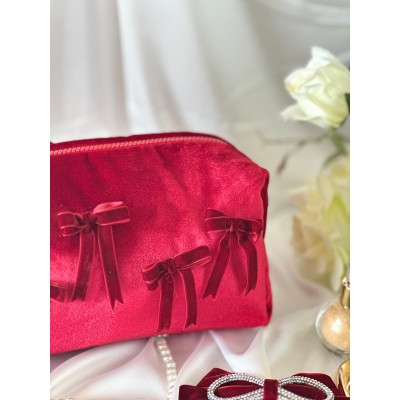 Medium red velvet cosmetic bag with bows
