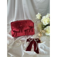 Medium red velvet cosmetic bag with bows