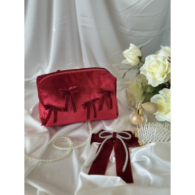 Medium red velvet cosmetic bag with bows