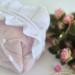 Medium soft pink cosmetic bag with ruffles, bows and pearl-like beads