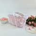 Medium soft pink cosmetic bag with ruffles, bows and pearl-like beads