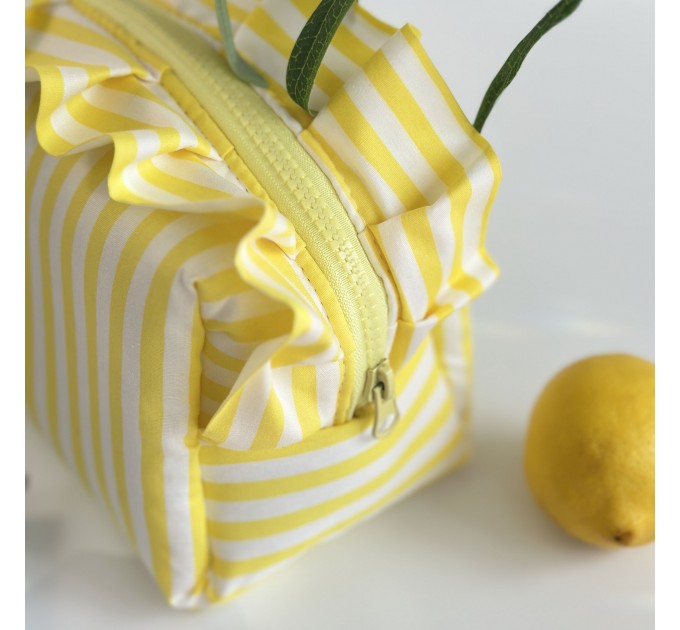 Medium yellow striped cosmetic bag with ruffles