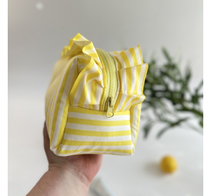 Medium yellow striped cosmetic bag with ruffles