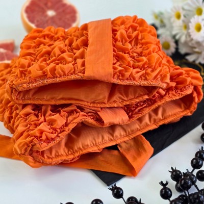 Grapefruit Orange Book Sleeve with ruffles on ties 