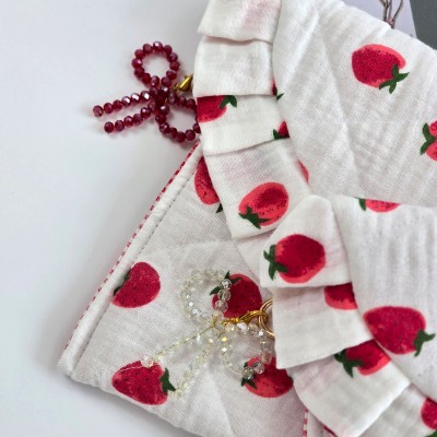 Strawberry book sleeve with ruffles and magnetic closure