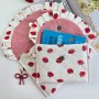 Strawberry book sleeve with ruffles and magnetic closure Strawberry book sleeve with ruffles and magnetic closure