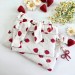 Strawberry book sleeve with ruffles on ties 
