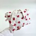 Strawberry book sleeve with ruffles on ties 