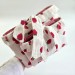 Strawberry book sleeve with ruffles on ties 