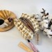 Small checkered brown cosmetic bag with ruffles