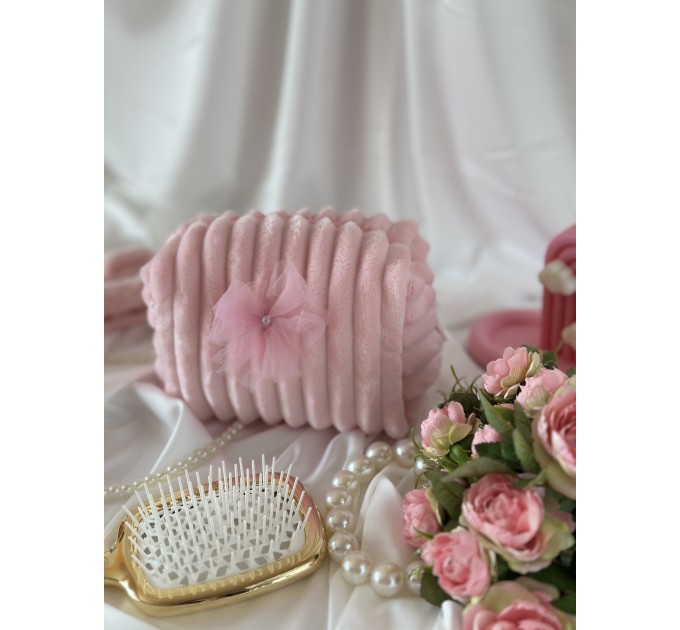 Small pink plush cosmetic bag with bows