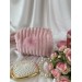 Small pink plush cosmetic bag with bows
