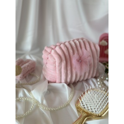Small pink plush cosmetic bag with bows